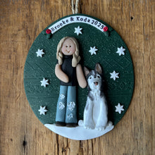 Load image into Gallery viewer, Decorative ornament with a person and dog on a green background, featuring the text 'Brooke &amp; Koda 2025'.
